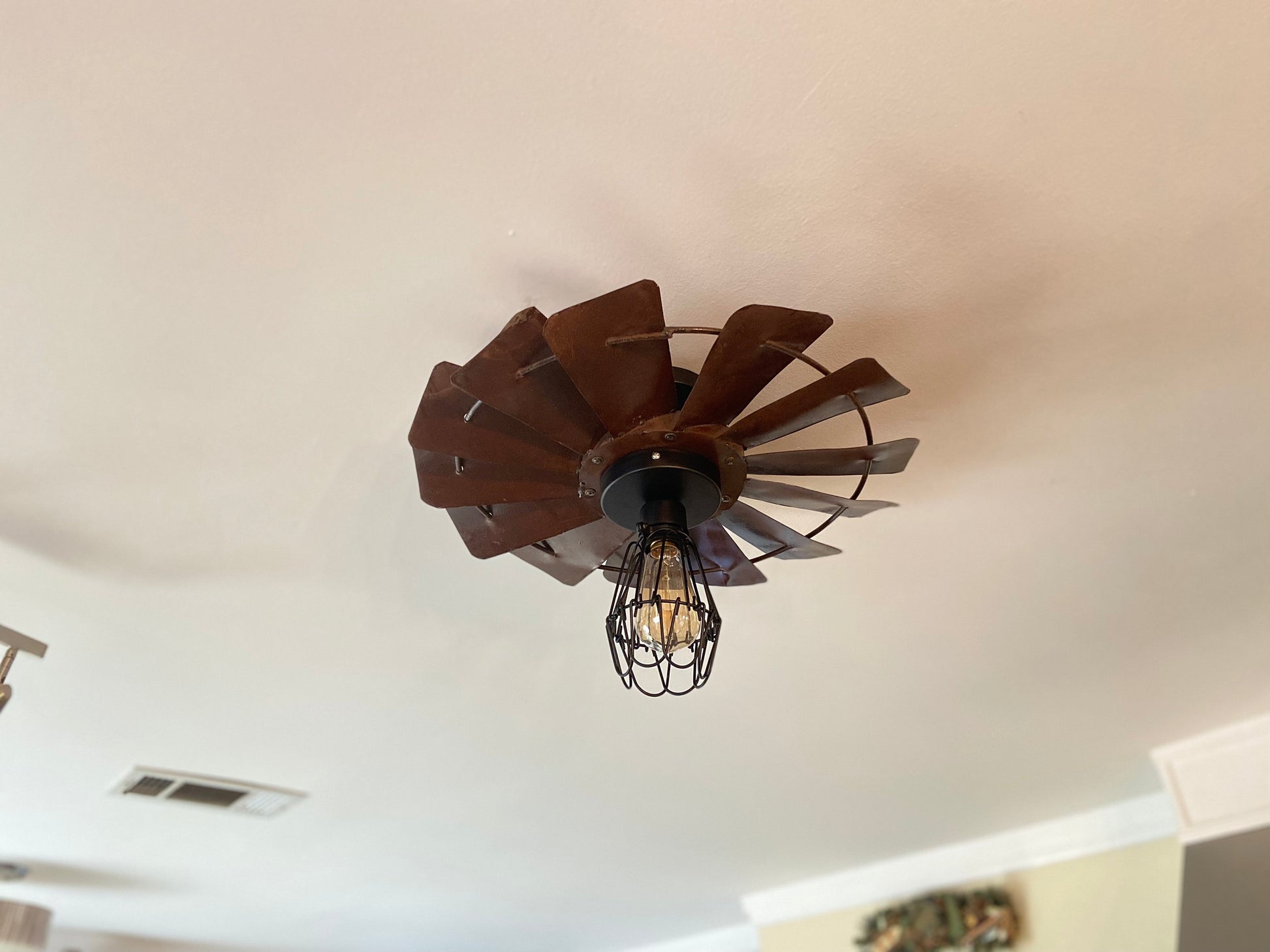 Rustic Farmhouse Windmill flush mount light fixture. Create a warm cozy vibe with this unique light for dining room or kitchen.