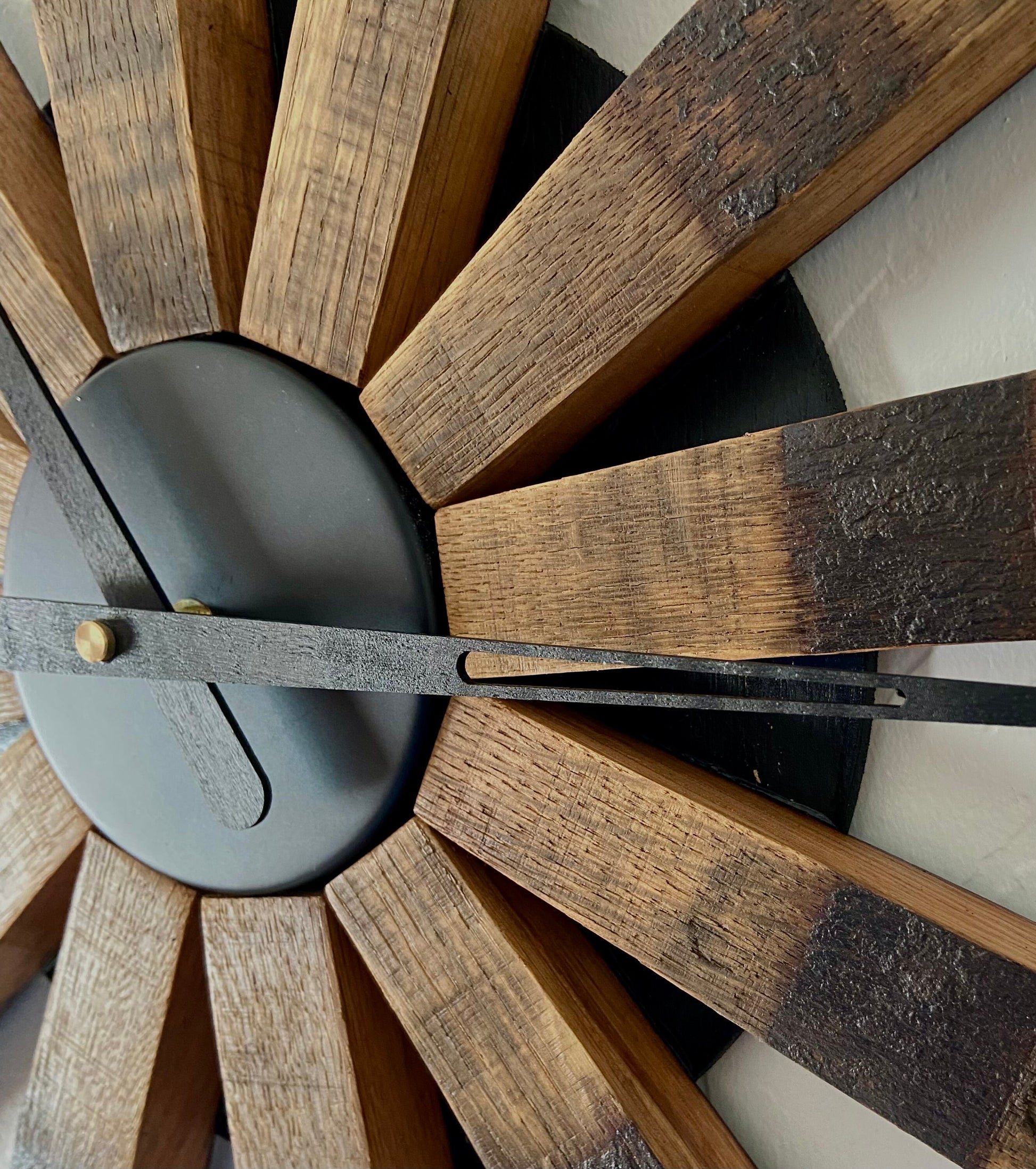 Handcrafted bourbon barrel clock made from retired whiskey barrel staves. Unique statement piece, an ideal gift for the whiskey lover
