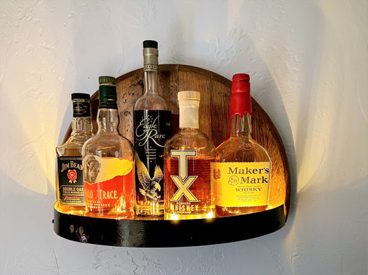 Illuminated whiskey barrel liquor display shelf perfect for displaying your bar collection, handcrafted from Kentucky bourbon barrel