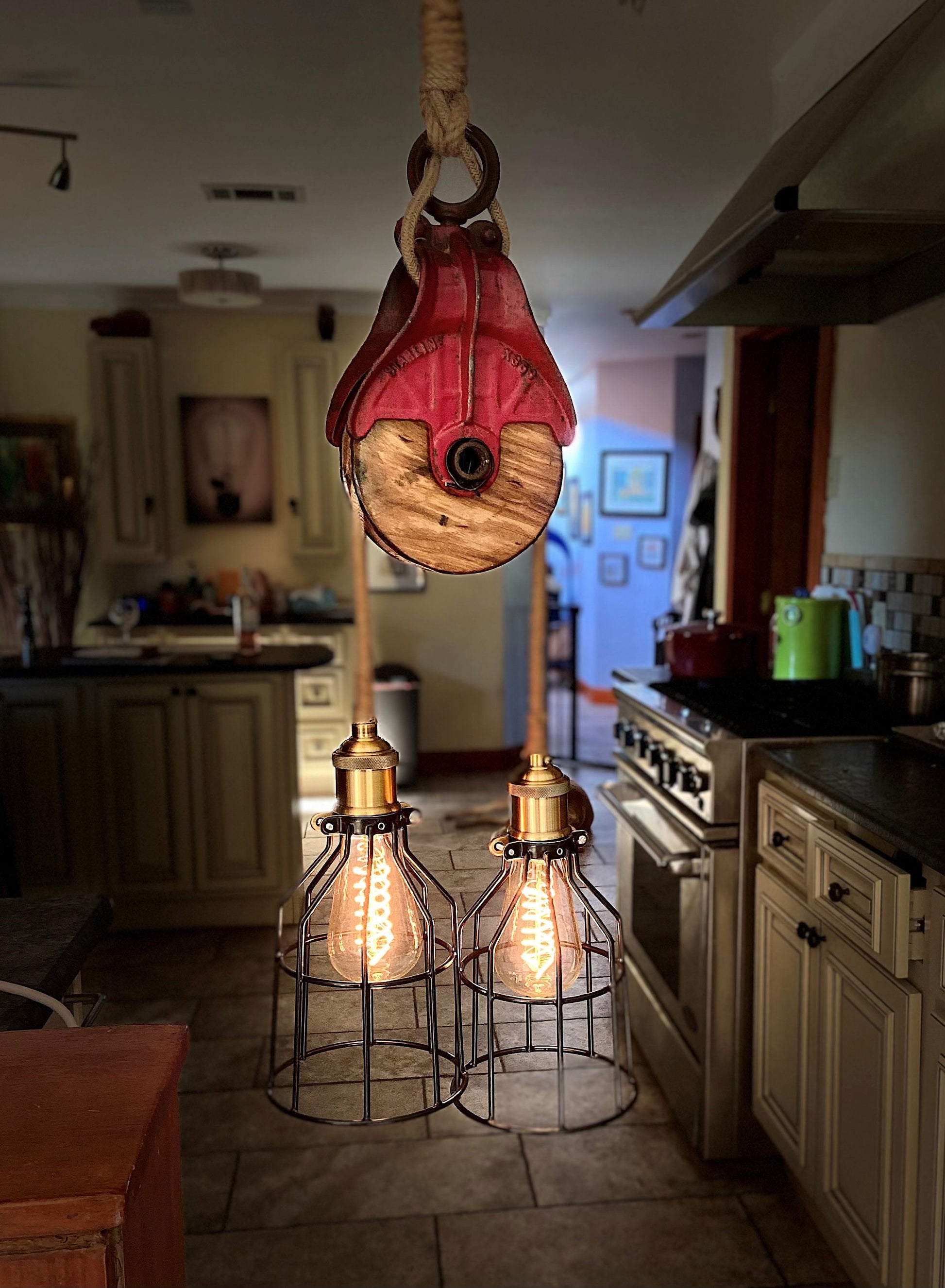Rustic farmhouse pulley lighting, pendant light with antique pulley for cabin decor, repurposed vintage pulley for kitchen / dining room