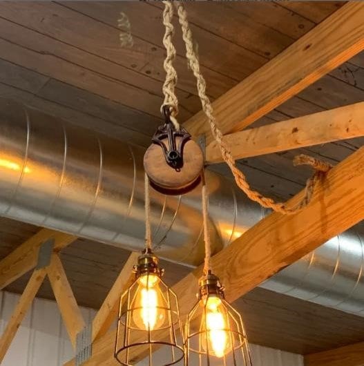 Rustic farmhouse pulley lighting, pendant light with antique pulley for cabin decor, repurposed vintage pulley for kitchen / dining room