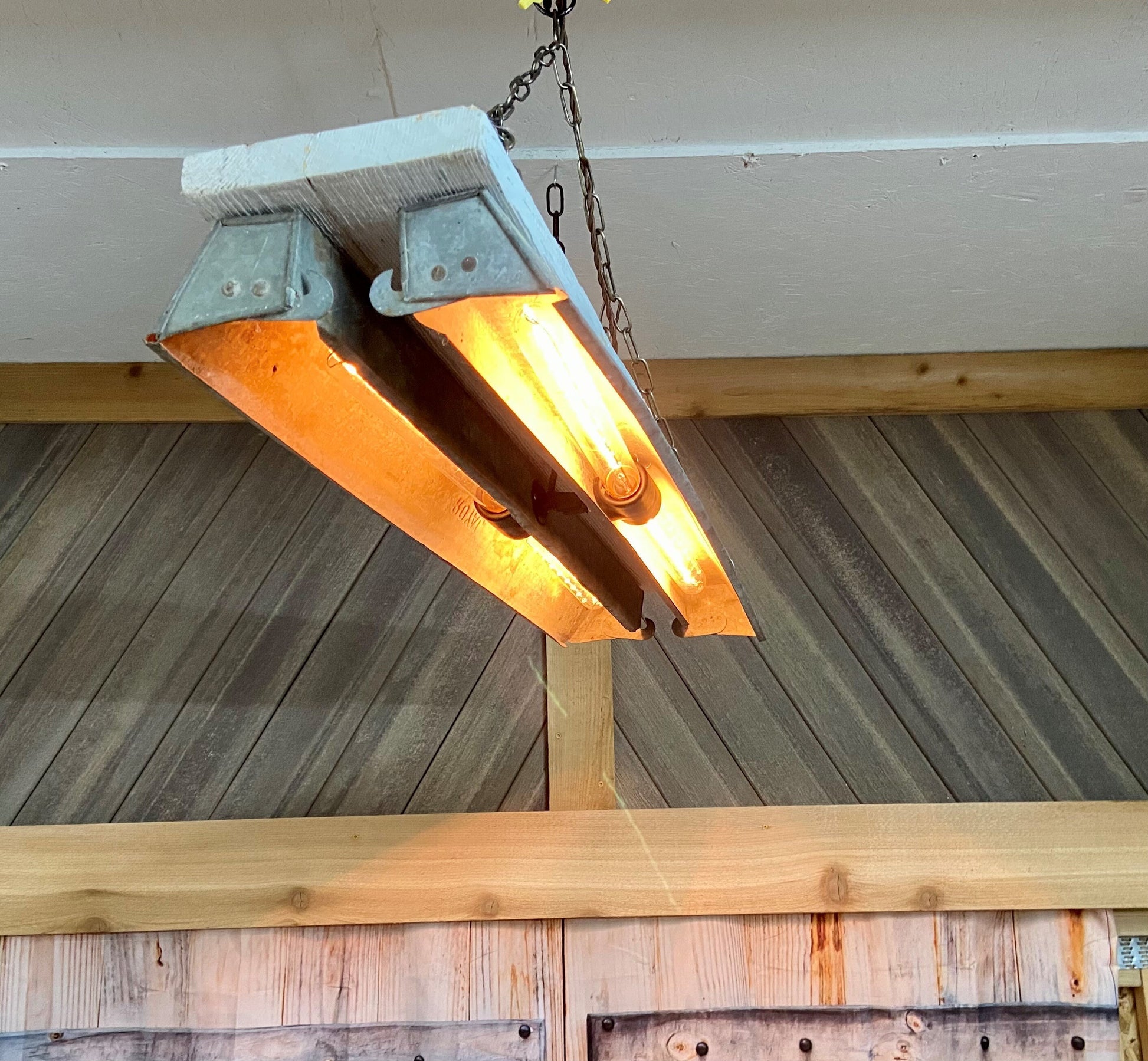 Rustic chandelier made from upcycled chicken feeders, unique light adds farmhouse charm to you kitchen or dinning room.