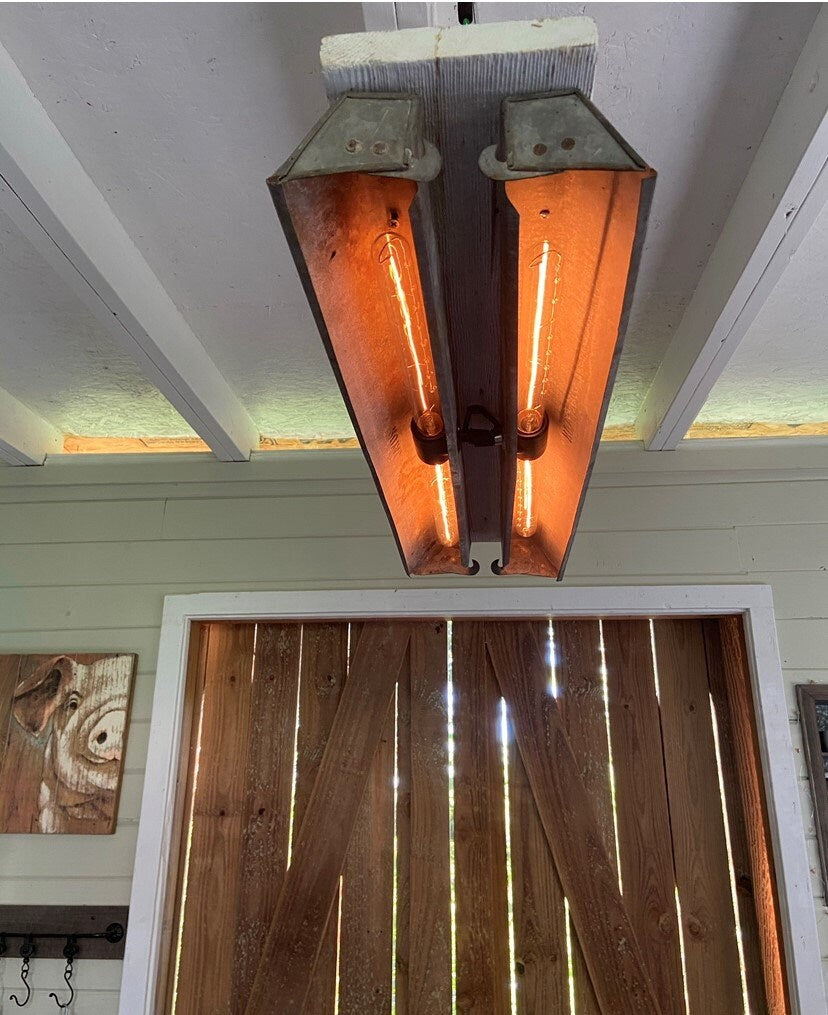 Rustic chandelier made from upcycled chicken feeders, unique light adds farmhouse charm to you kitchen or dinning room.