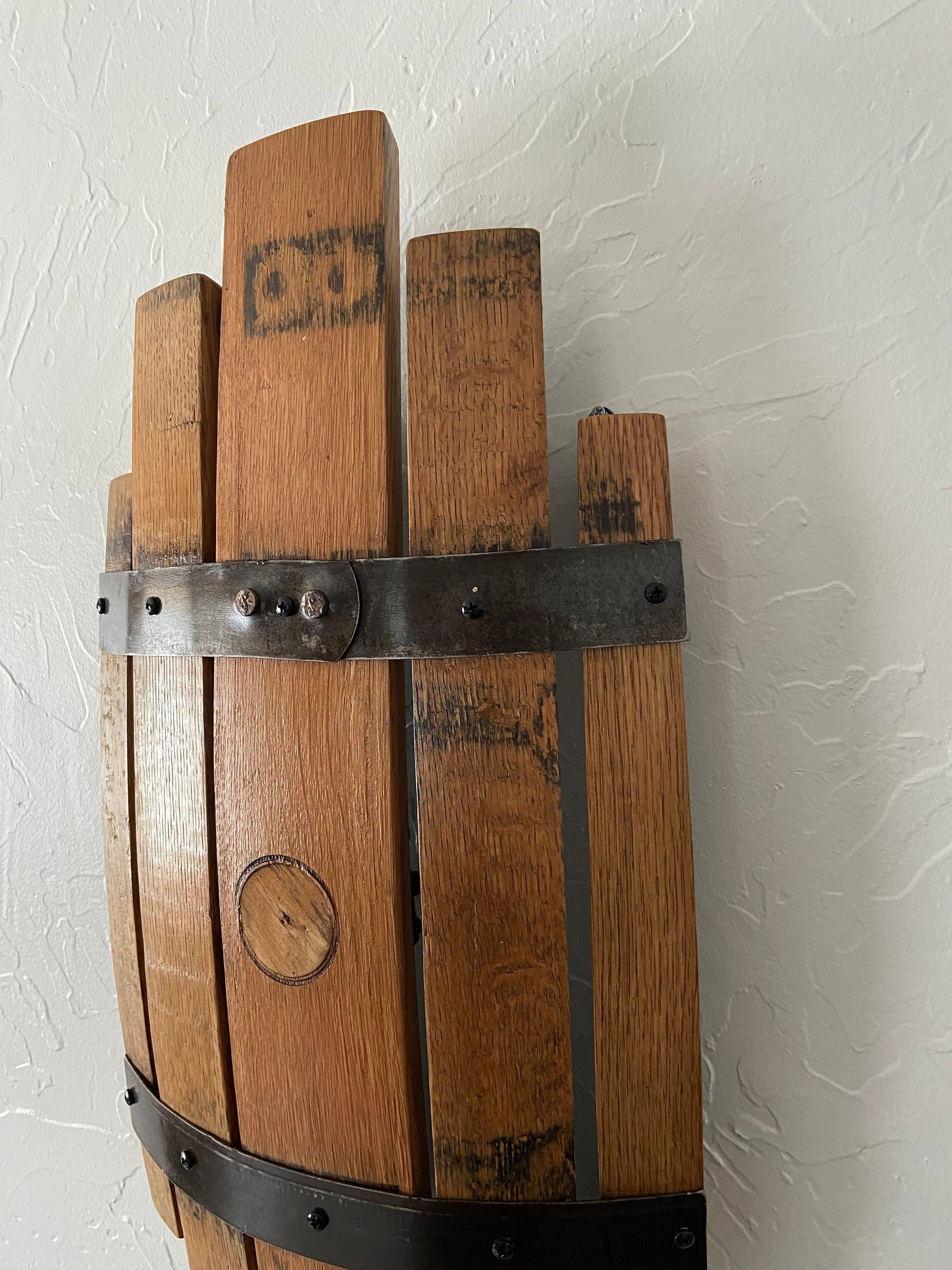 Bourbon barrel stave sconce, rustic charm from handcrafted wall light, whiskey barrel staves offers functionality with stylish wall art