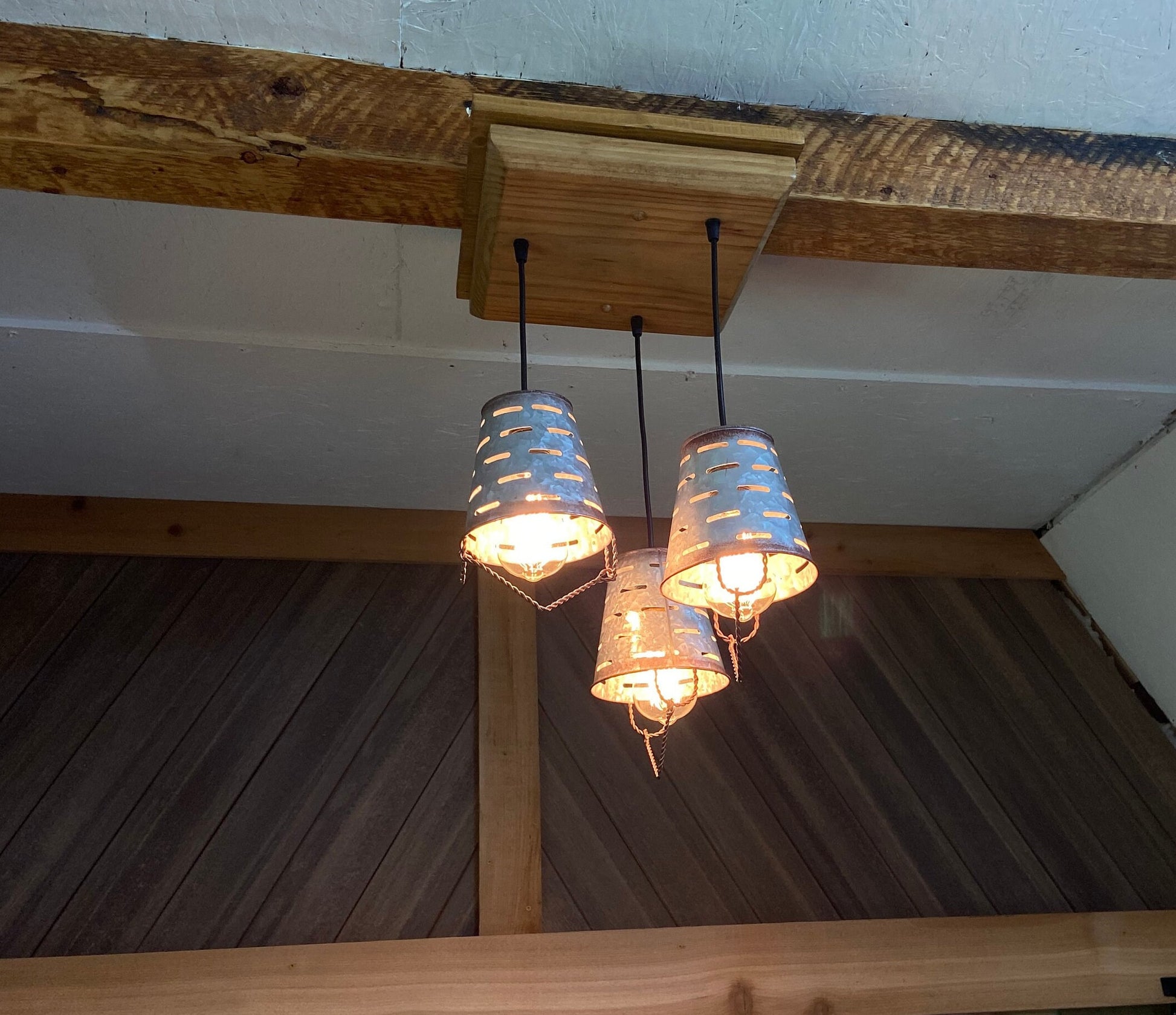 Rustic farmhouse three light fixture with olive bucket shades, wooden ceiling pendant with 3 galvanized metal bucket lights for cabin decor