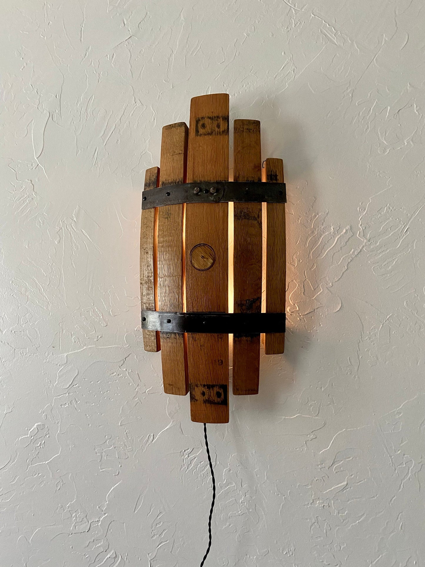 Bourbon barrel stave sconce, rustic charm from handcrafted wall light, whiskey barrel staves offers functionality with stylish wall art