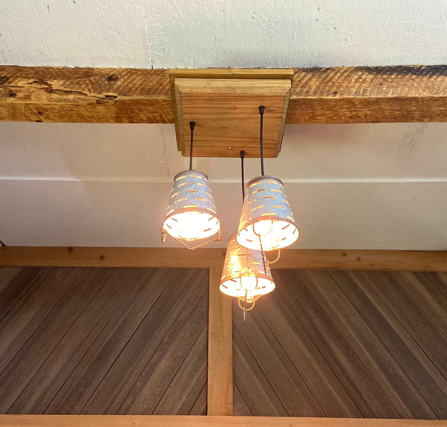 Rustic farmhouse three light fixture with olive bucket shades, wooden ceiling pendant with 3 galvanized metal bucket lights for cabin decor