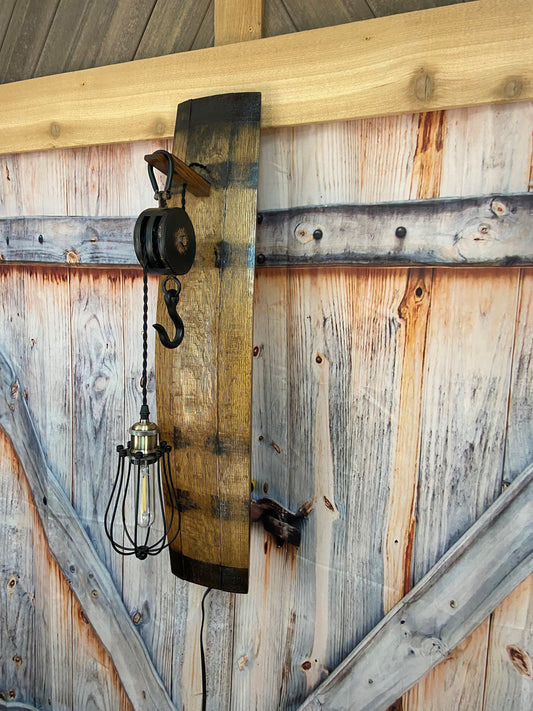 Wall sconce light from whiskey barrel staves, rustic decor with metal pulley, mancave bourbon barrel wall light for bar or cigar room