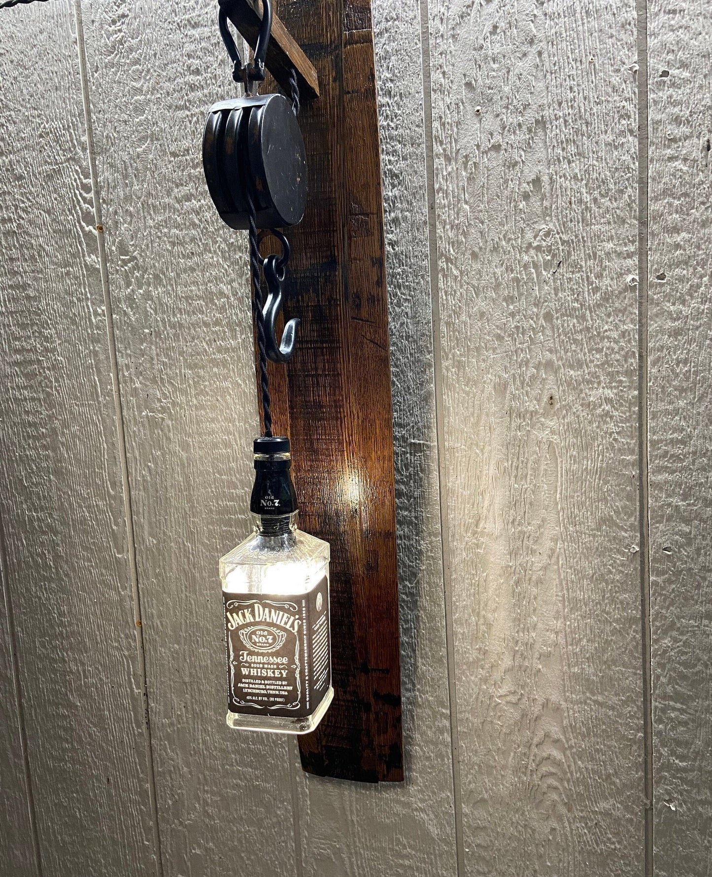 Sconce light features Jack Daniels bottle, whiskey barrel wall light for bar room or mancave, bourbon lovers gift with metal pulley