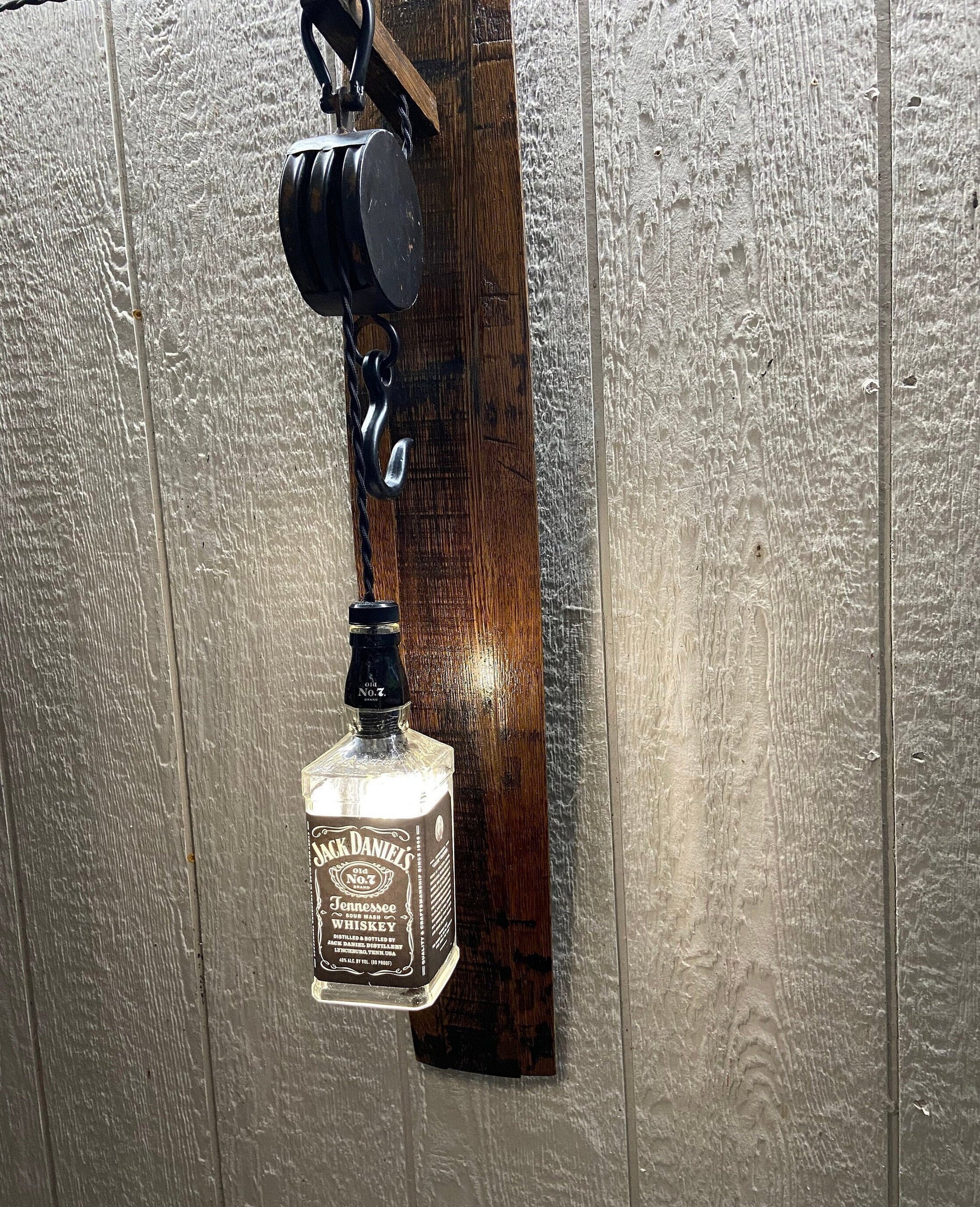 Sconce light features Jack Daniels bottle, whiskey barrel wall light for bar room or mancave, bourbon lovers gift with metal pulley
