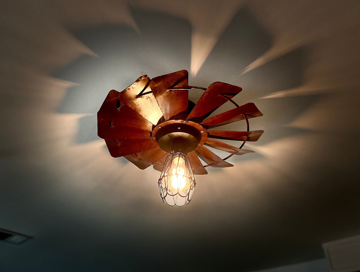 Rustic Farmhouse Windmill flush mount light fixture. Create a warm cozy vibe with this unique light for dining room or kitchen.