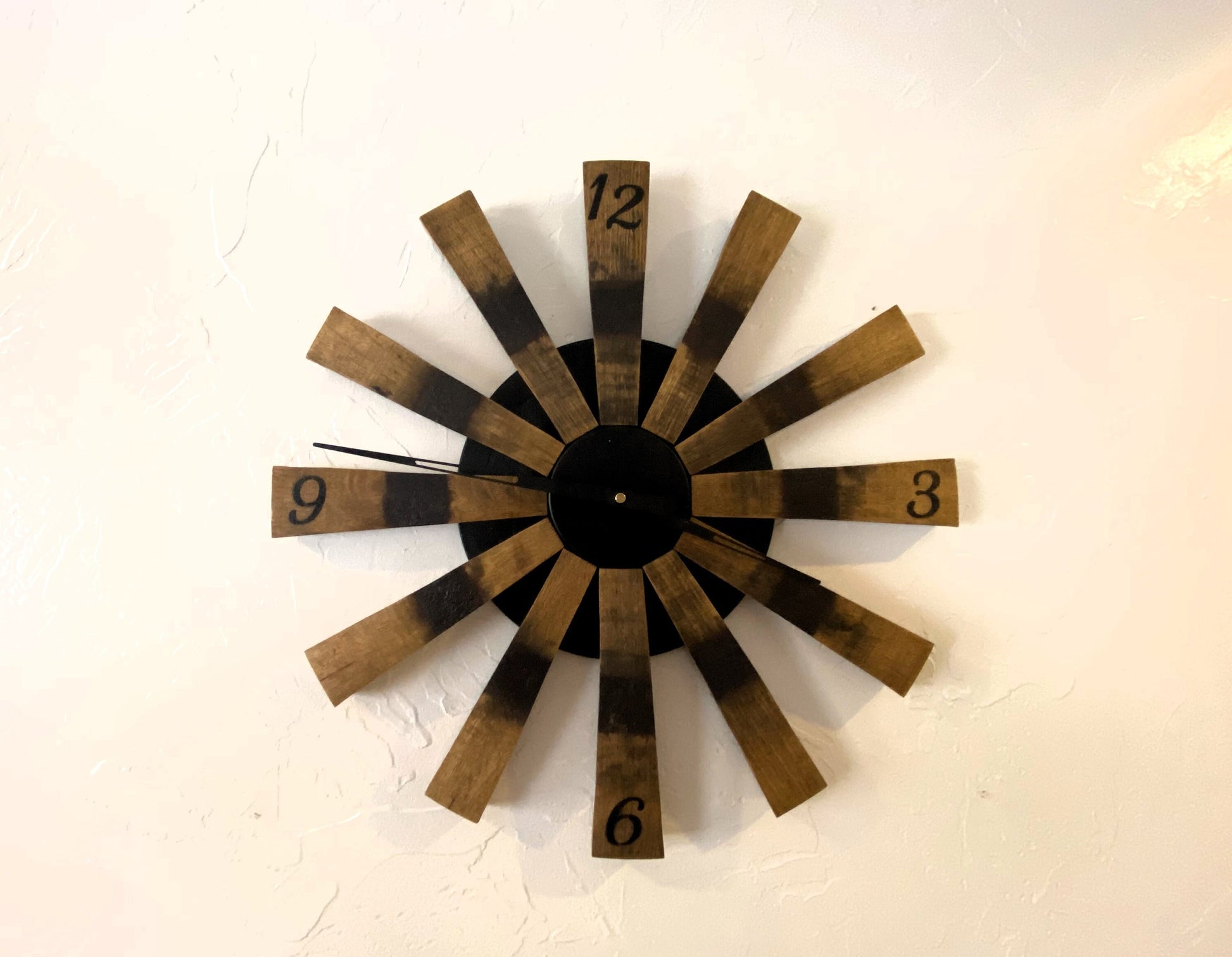 Handcrafted bourbon barrel clock made from retired whiskey barrel staves. Unique statement piece, an ideal gift for the whiskey lover