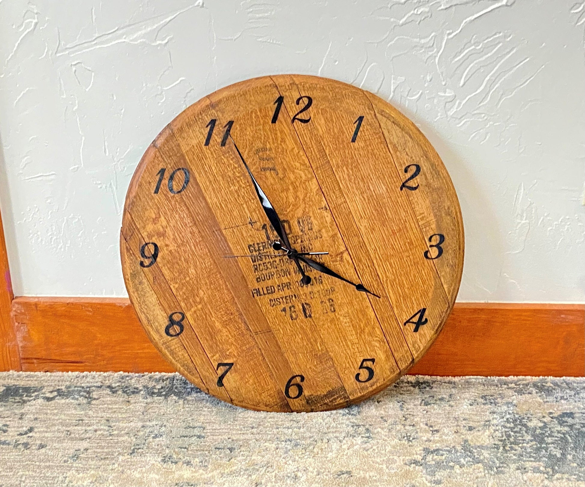 Whiskey barrel wall clock, genuine bourbon barrel lid used to create this handcrafted wall clock. Ideal gift for the whiskey lover.