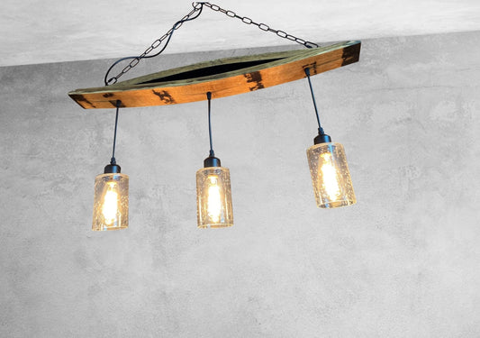 Unique ceiling pendant light from authentic bourbon barrels staves, ideal for bar or man cave, adds warmth and character