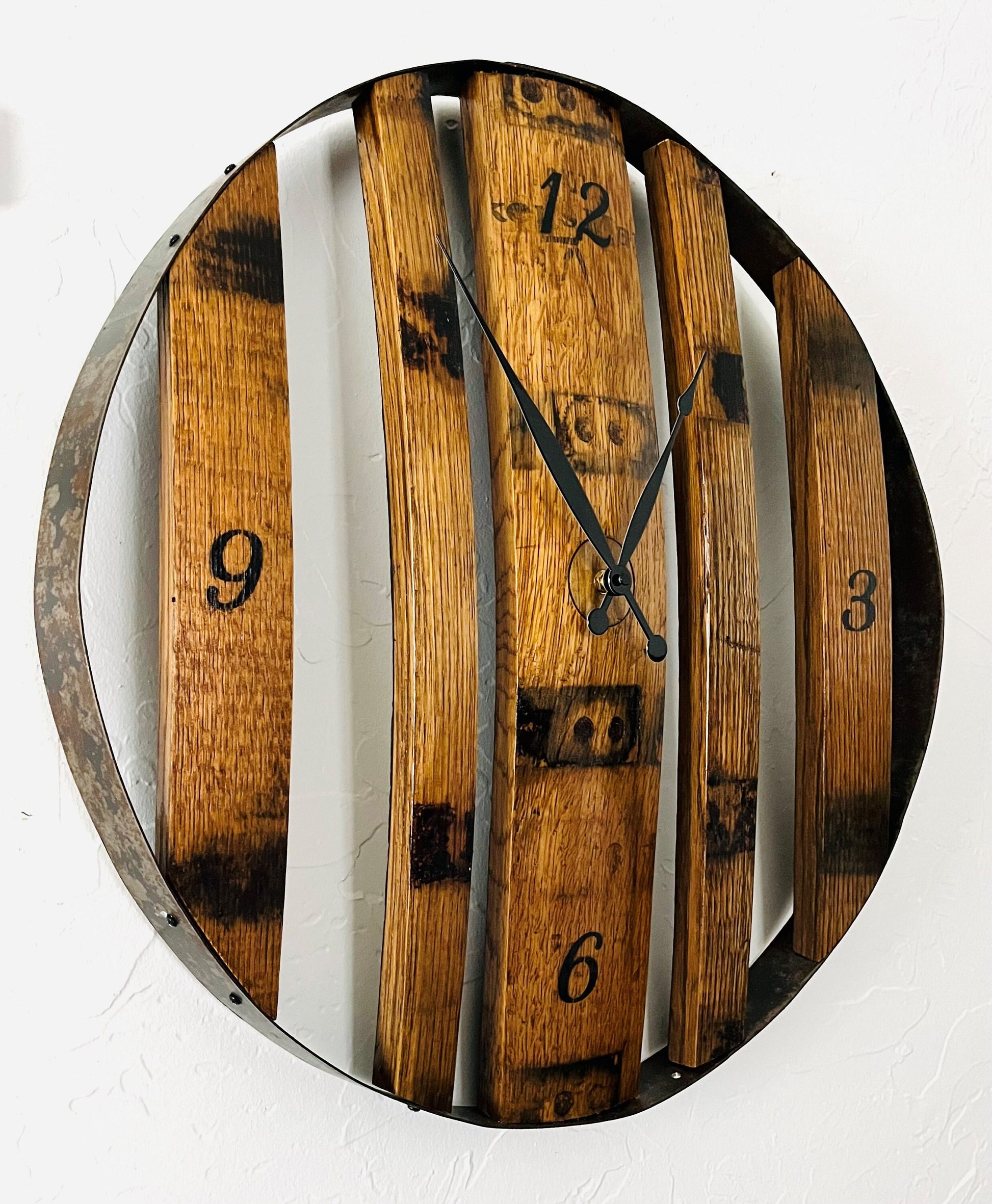 Large 24" Bourbon barrel wall clock with genuine barrel staves and metal band. Perfect in a bar room or mancave, ideal whiskey lover gift