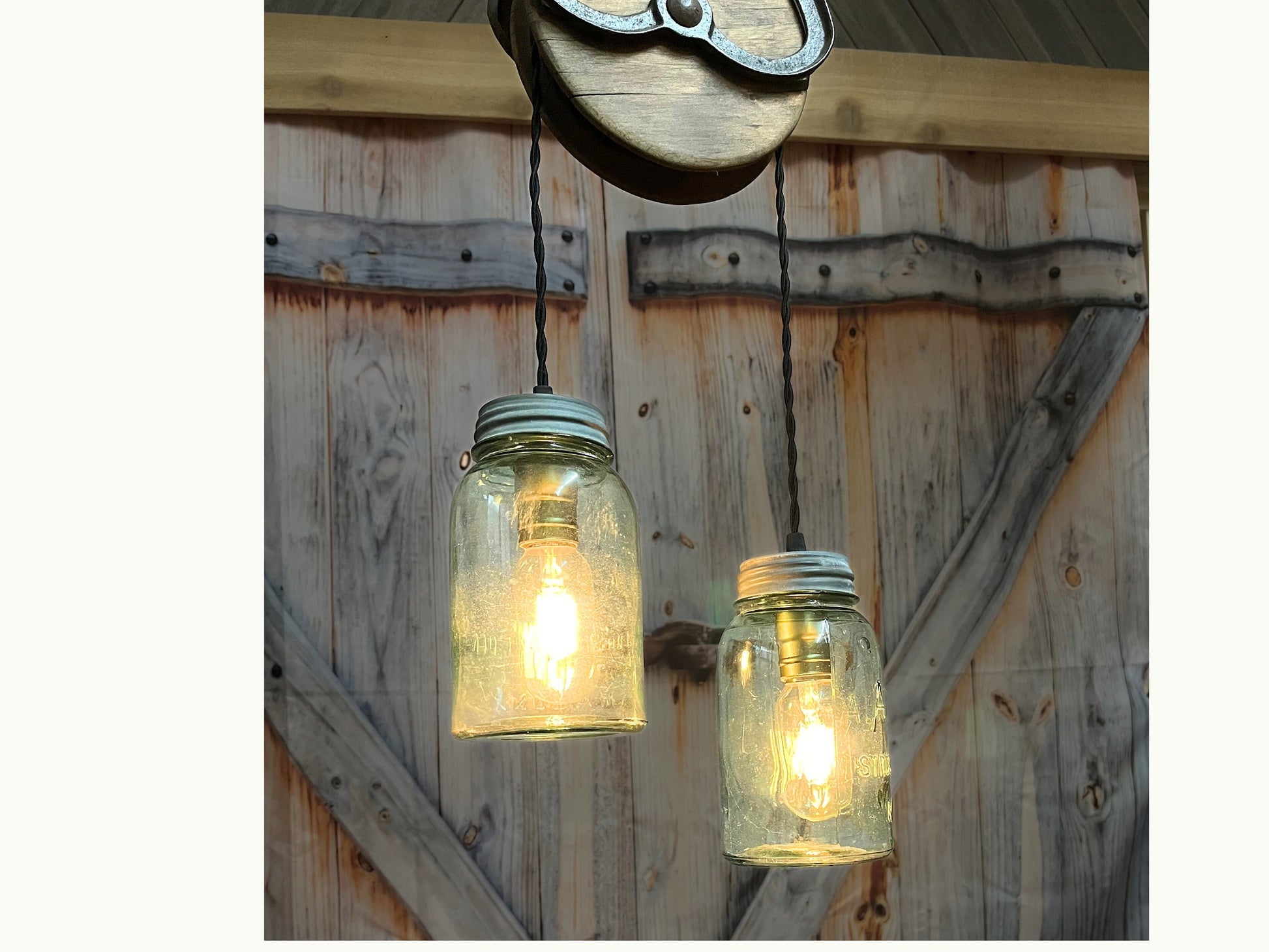Rustic farmhouse pendant lighting, with antique farm pulley and vintage mason jar lights, cabin style for kitchen, dining room